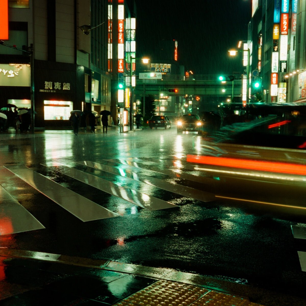 Imagine Art output: a rainy Tokyo crossing at night with neon reflections